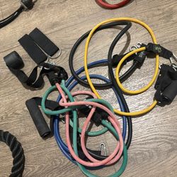 One Pulley System, One Fitness Insanity Bands New And One S. Bands Used.