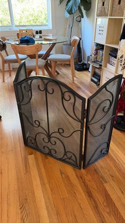 Cast iron fireplace screen