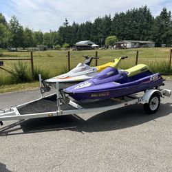 Pair Of Waverunners On Double Trailer
