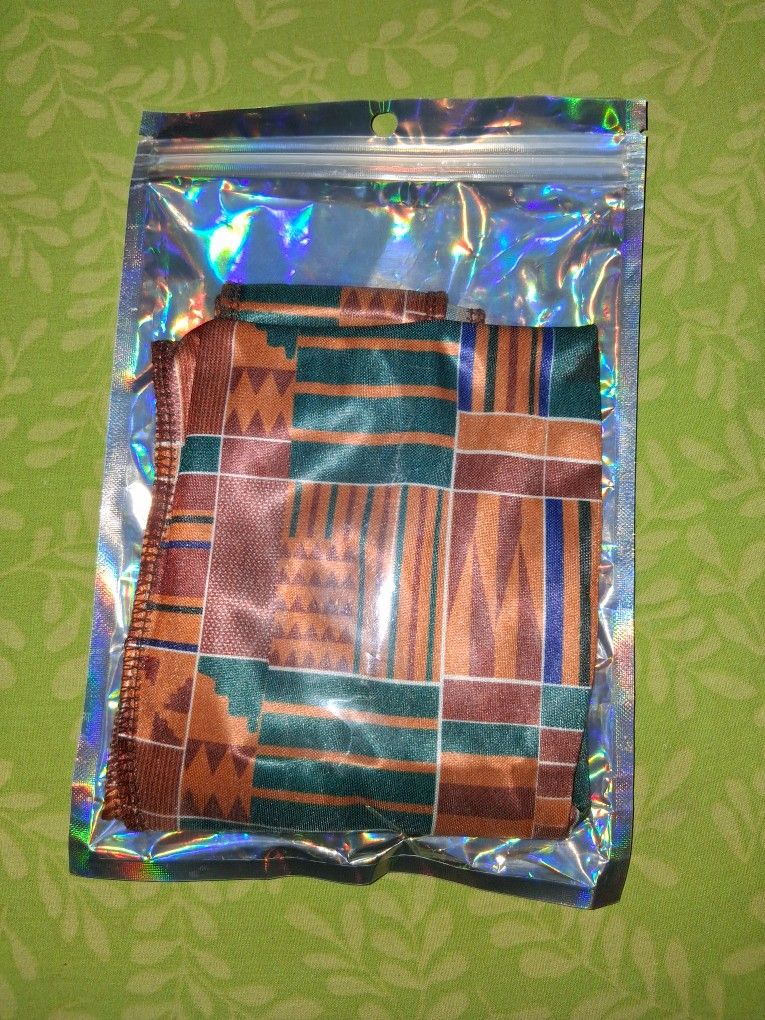 durag with a Kente cloth or African print pattern