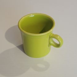 Fiesta Lemongrass Green Mug Homer Laughlin 3.5" Tall Cup Mug Ring 
Handle. Pre-owned, very good shape, no chips or cracks, please see 
photos for deta