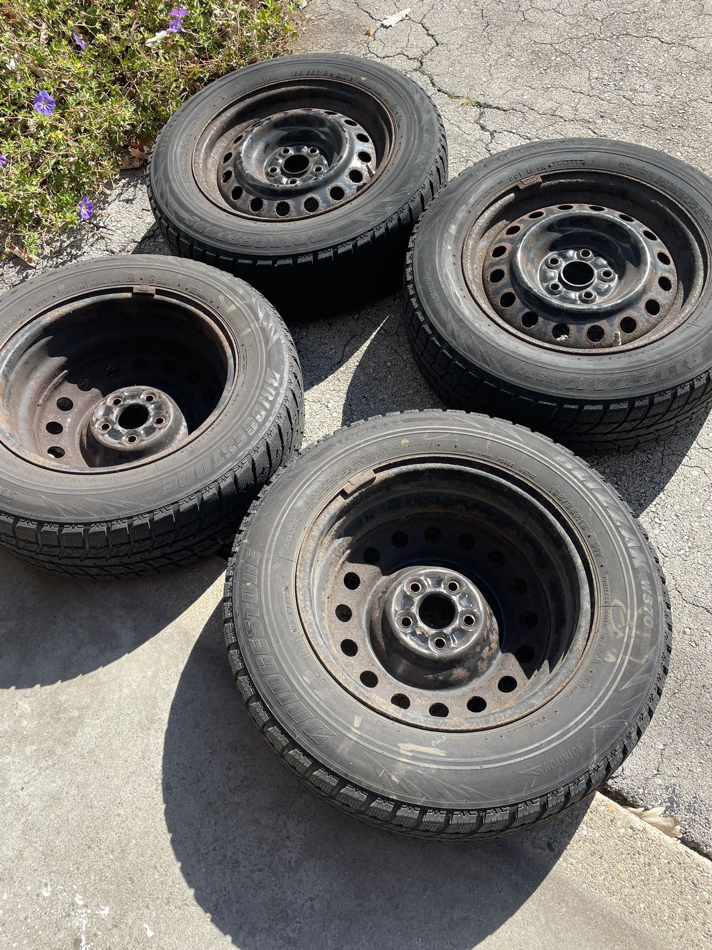 4 Used Bridgestone Blizzak Tires/Steel Wheels