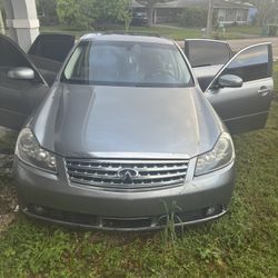 Infiniti M45 (PART OUT)Tail lights and 4 good rims