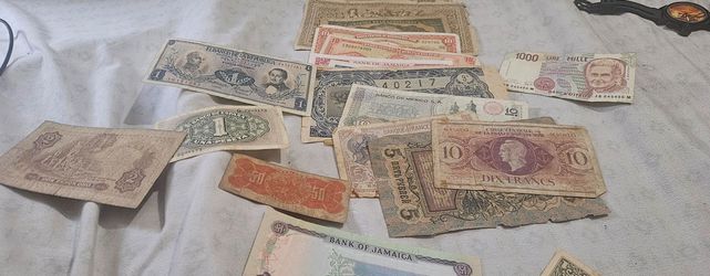 All different types of old money some dating from nineteen twelve