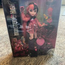 Monster High Draculaura doll with accessories.