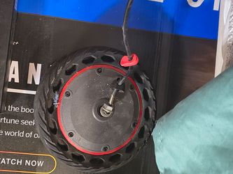 Electric scooter hub motor with tire