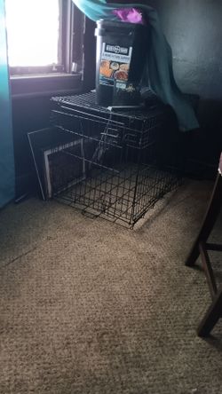 Dog cage for medium to small dog.