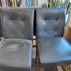 Dinning Table And 4 Chairs One Of Them Worn