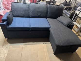 The blue and black sofa can be freely placed according to the room type