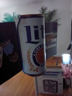 Miller lite stand logo metal on a pole and stand