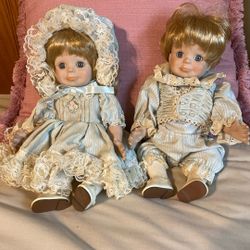 Porcelain Baby Girl and Baby Boy Dolls ($30 Pair)
