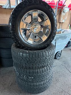 Chrome 20” original Chevy Silverado wheels with cooper tires