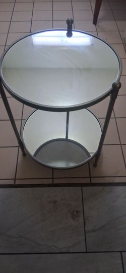 Round mirrored side table