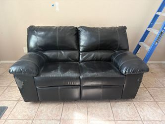Black leather reclining couch