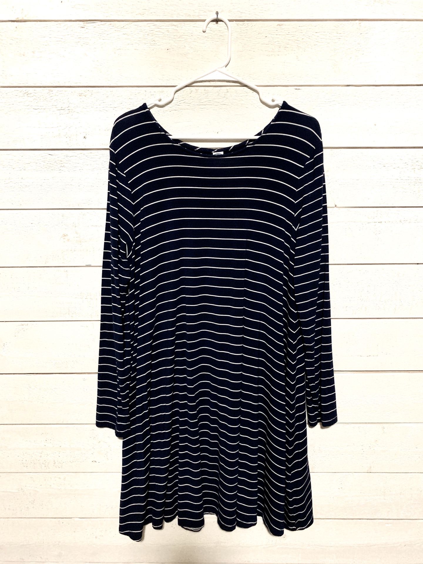 Woman’s navy and white stripped dress