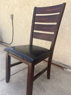 Brown wood dining chair