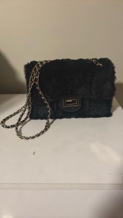 Black furry purse