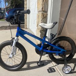 RoyalBaby Freestyle Kids Bike in blue  AND Spin Master Games Shark Strike board game. 