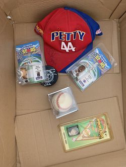 box full of sports historical and disney collectibles..price is for entire box