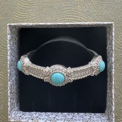 JUDITH RIPKA Turquoise CZ Diamonique STERLING Hinged CUFF BRACELET  This stunning cuff bracelet by Judith Ripka is an original piece with a beautiful 