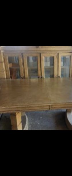 Dining room Elegant table with China cabinet.
