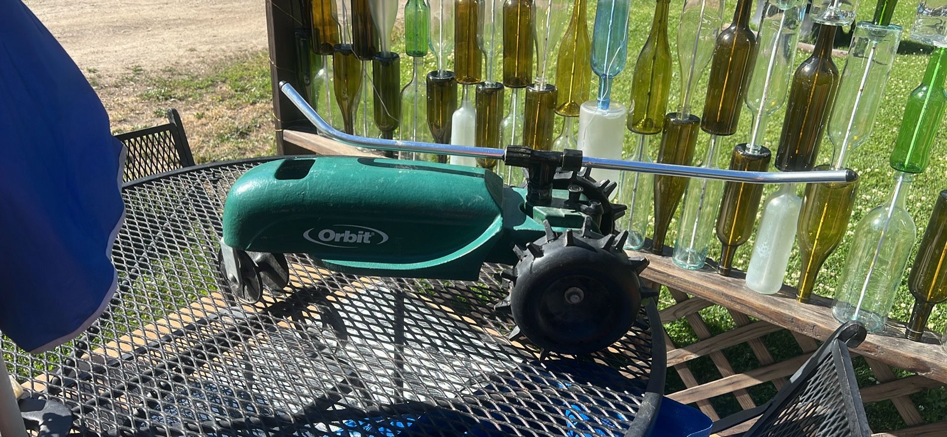 Traveling tractor sprinkler