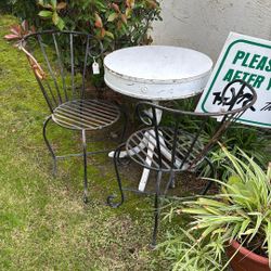 Two Chairs And White Table 