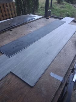 Vinyl floor planking with rubber backing on the back.\nA dollar square foot your deal.We can install it too.If you like delivery and install , we have