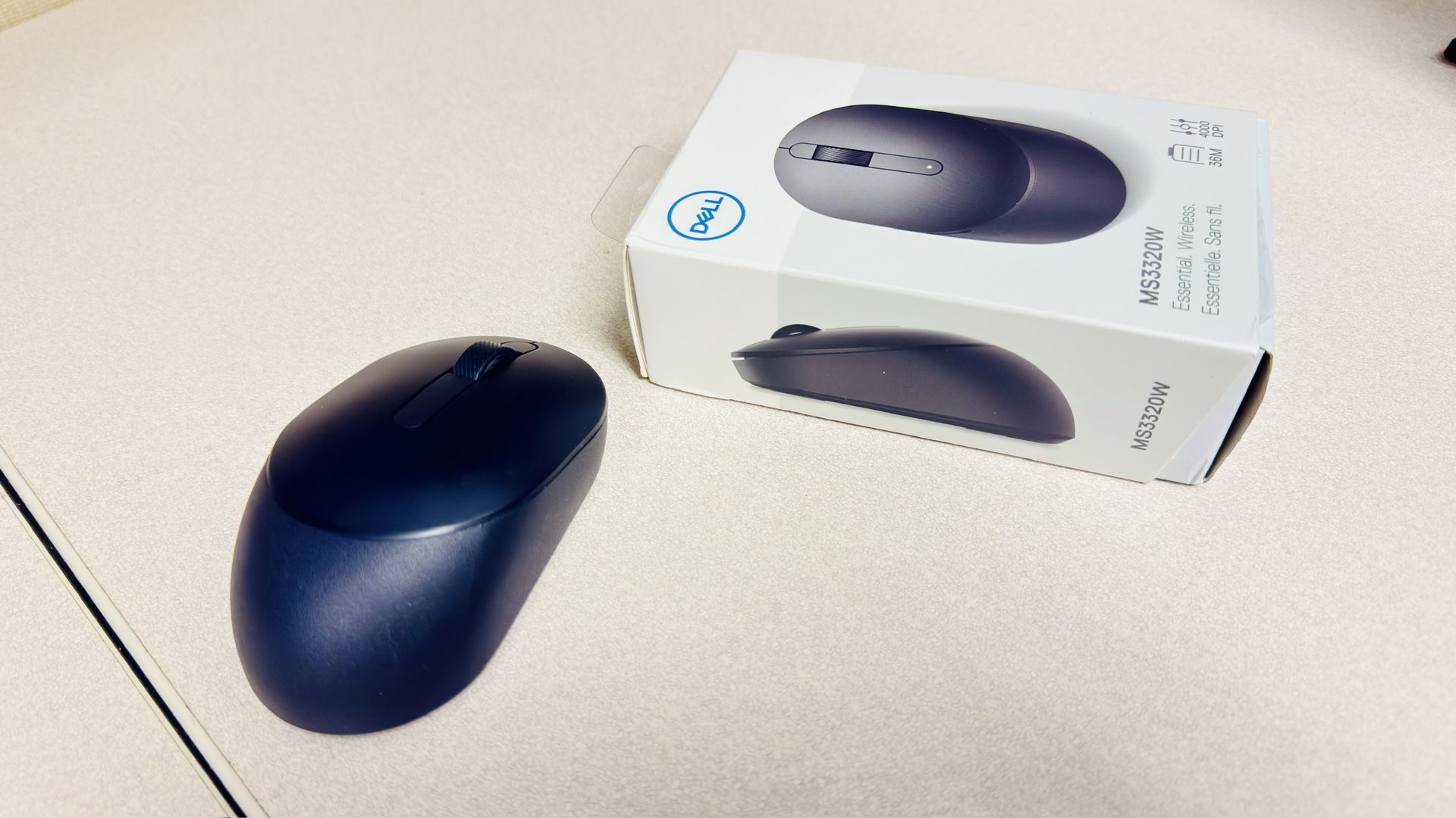 Dell Mobile Wireless Mouse - MS3320W, Wireless - 2.4 GHz, Bluetooth 5.0, Optical LED, Mechanical Scroll, 1600 DPI, 3-Buttons - Black - Opened and neve