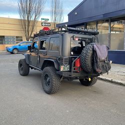 GARVIN  Expedition Rack 07-18 Jeep JK Wrangler 4 Door with Wind Deflector and Shower 