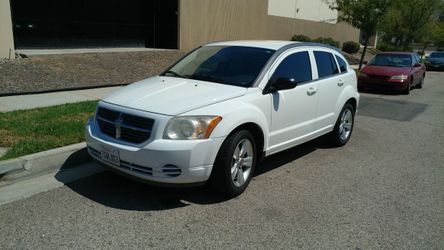 2010 Dodge caliber payments with 1300 deposit Espanol