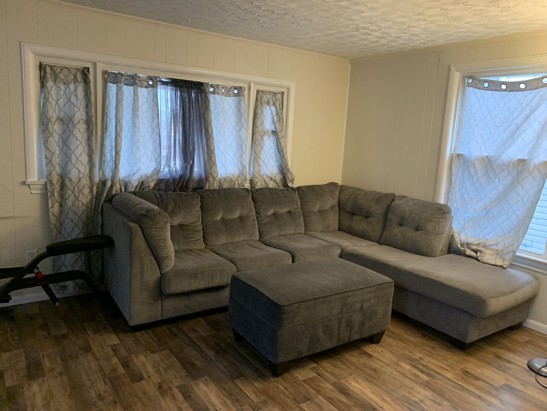 Grey Sectional + Ottoman ‘ 