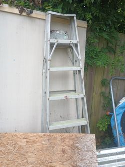 8 Ft Ladder And Two DeWalt Saw Horses