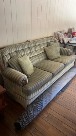 Vintage green velvet sofa