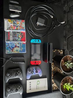Nintendo Switch with 3 pro controllers and 3 games