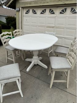 White Pedestal Dining Table with 6 Counter Height Chairs