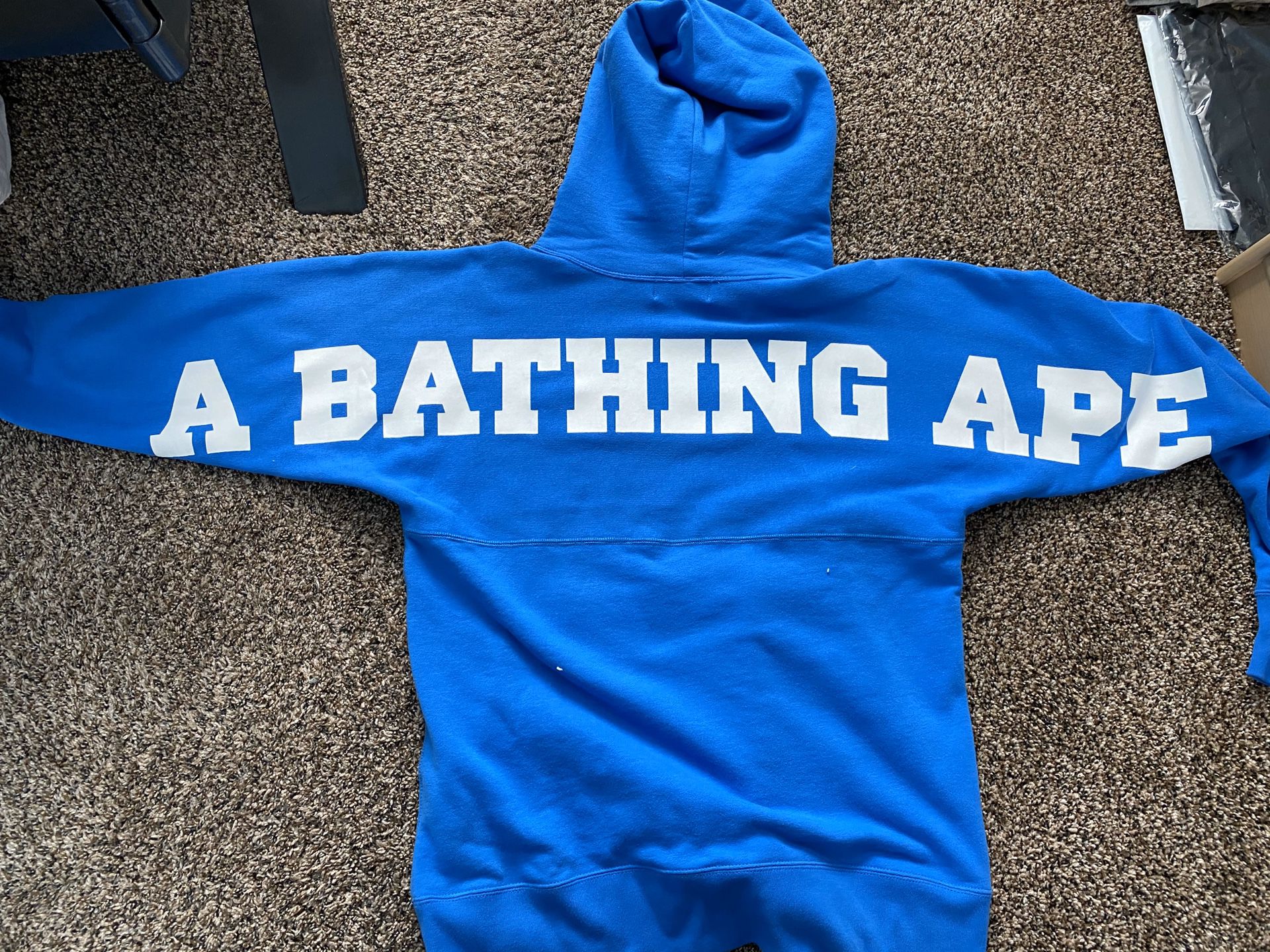 Bathing Ape, World Gone Mad hoodie.