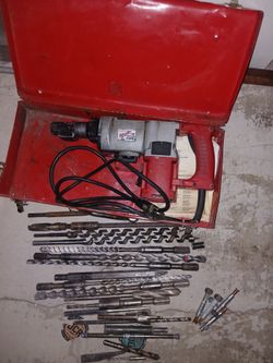 Heavy duty Milwaukee Rotary Hammer with plenty of bits aswell