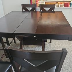 Dining Table Set – 6 Chairs + Leaf Extension – Solid Wood (Bob’s Furniture)