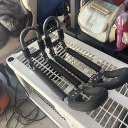 J-style roof rack carriers