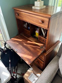 Vintage solid wood desk with four drawers for Storage and writing surface.28 “ wide,16 “ depths, 48 “ high .$80