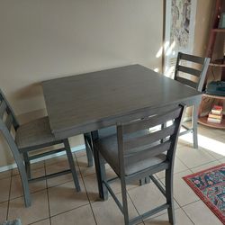 Kitchen table and four high chairs