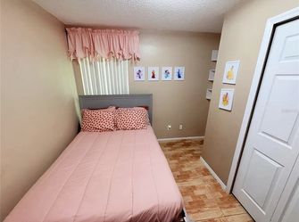 Gray Twin Bed with Mattress — Repaired Frame