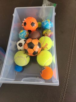 small balls, several different sizes, tiny soccer kids ball, tennis balls