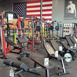 Olympic Adjustable Bench – Smith Machine – Squat Rack – Rubber Flooring – Dumbbells – Weights – Bumper Plates – Bar