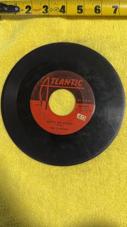 This item is a vintage Atlantic Records 45 RPM vinyl record by The Clovers, featuring the songs "Devil or Angel" and "Love, Love, Love". 