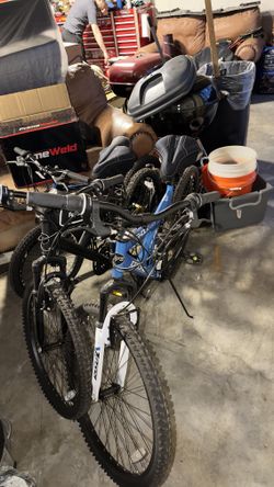 2 Adult And 1 Adolescent Mountain Bike With Bike Rack