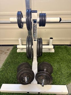 Olympic weight tree + Olympic weight plates and adjustable dumbbells