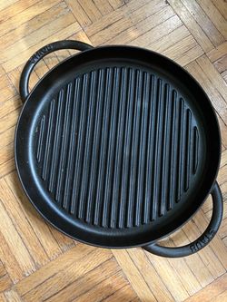 staub cast iron skillet round grill pan 30 cm with handles made in france. Approximately 12” in diameter. Cash only. Pick up only. Midtown West.