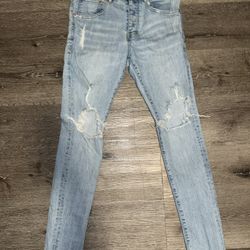 PURPLE Brand Light Wash Distressed Skinny Jeans